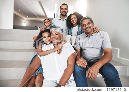 Love, stairs and group portrait of happy family bonding, hug and enjoy quality time together in their house. Holiday smile, happiness and relax children, parents and grandparents in vacation home 129718340