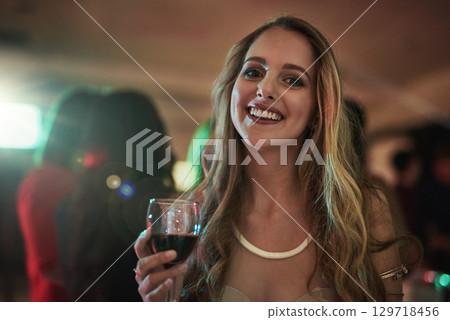 Party, drink and portrait of woman in nightclub having fun at rave, concert and social event with alcohol. Celebration, birthday and happy girl enjoying night with music, crowd and cocktail at disco 129718456