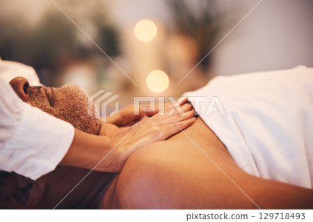 Massage, spa and therapist hands with man client in luxury, zen or calm room with physical therapy, wellness and vacation healing. Bokeh, healthcare service and beauty worker giving a body treatment Massage, spa and therapist hands with man client in luxury, zen or calm room with physical therapy, wellness and vacation healing. Bokeh, healthcare service and beauty worker giving a body treatment 129718493