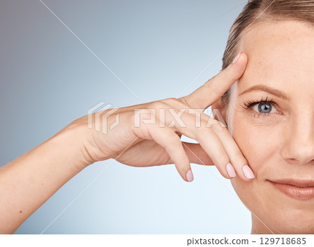 Beauty, skincare and hand holding woman face portrait after manicure, facial and skin wellness. Cosmetic, model and dermatology from self care, spa and luxury body glow treatment with a smile 129718685