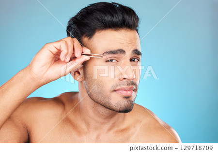 Eyebrow hair, tweezers and portrait model doing hair removal routine, beauty grooming or eyebrows maintenance treatment. Face cleaning tools, spa wellness salon or man with self care bathroom product Eyebrow hair, tweezers and portrait model doing hair removal routine, beauty grooming or eyebrows maintenance treatment. Face cleaning tools, spa wellness salon or man with self care bathroom product 129718709