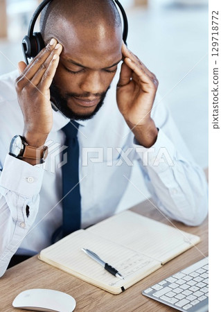 Stress, burnout and anxiety by call center worker, employee and customer service consultant in office. Headache, mental health and depressed telemarking agent frustrated at the workplace Stress, burnout and anxiety by call center worker, employee and customer service consultant in office. Headache, mental health and depressed telemarking agent frustrated at the workplace 129718772