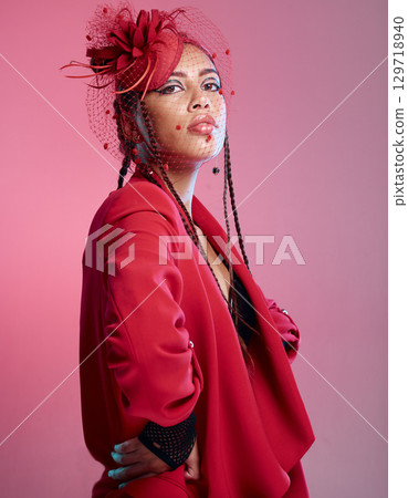Woman, red fashion and edgy portrait, trendy and vintage wear in studio. Punk model, funky rock metal or retro style 90s clothes and modern, creative designer or stylish aesthetic in pink background 129718940