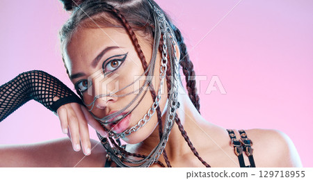 Punk fashion, Gen z girl and portrait with creative makeup and face in pink studio background with edgy attitude. Cosmetics, facial and eye shadow with a young female posing for hipster or style 129718955