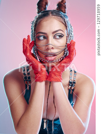 BDSM, fetish and fashion with a model black woman in studio on a pink background for bondage, punk or rock. Leather, sexy and mask with a female inside for halloween or cosplay BDSM, fetish and fashion with a model black woman in studio on a pink background for bondage, punk or rock. Leather, sexy and mask with a female inside for halloween or cosplay 129718959