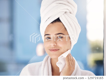 Beauty, face and cleaning with facial and woman after shower in towel for hygiene and grooming in skincare portrait. Healthy skin with treatment, cosmetics and cloth for wellness and fresh glow. Beauty, face and cleaning with facial and woman after shower in towel for hygiene and grooming in skincare portrait. Healthy skin with treatment, cosmetics and cloth for wellness and fresh glow. 129719165