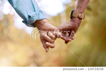 Retirement, senior couple and holding hands for love, romance and bonding together. Romantic, hand gesture and loving for relationship, marriage and support for anniversary, retired and healthcare. 129719236
