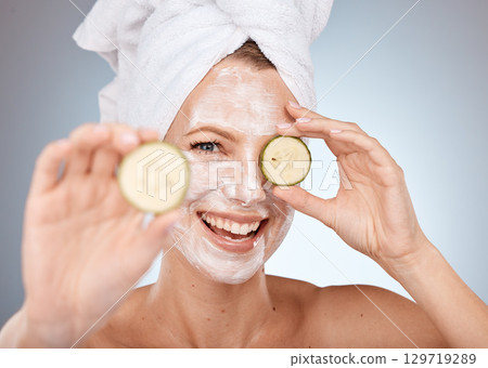 face mask, cucumber and smile for woman skincare beauty wellness, salon spa care or skin health portrait in studio. Luxury facial care, happy dermatology and natural skin therapy or healthy detox face mask, cucumber and smile for woman skincare beauty wellness, salon spa care or skin health portrait in studio. Luxury facial care, happy dermatology and natural skin therapy or healthy detox 129719289