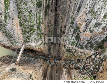 Caminito del Rey walking trail, Kings little pathway, Aerial Drone views of El Chorro Gorge, Ardales, Malaga, Spain. Caminito del Rey walking trail, Kings little pathway, Aerial Drone views of El Chorro Gorge, Ardales, Malaga, Spain. 129719501