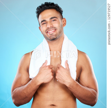 Man, skincare and healthcare for clean living health wellness, body care hygiene and healthy lifestyle advertising on blue background. Portrait of cosmetics model, towel or skin care shower mockup Man, skincare and healthcare for clean living health wellness, body care hygiene and healthy lifestyle advertising on blue background. Portrait of cosmetics model, towel or skin care shower mockup 129719527