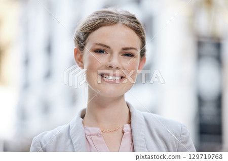 Portrait of a smile of a happy woman entrepreneur outside with vision for a success in business and her startup company. Corporate worker, startup or manager face looking cheerful with motivated 129719768