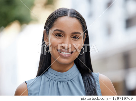 Happy fashion business woman leader with a vision, mindset and motivation for success. Portrait smile of a young entrepreneur or corporate professional face with bokeh and city street background 129719769
