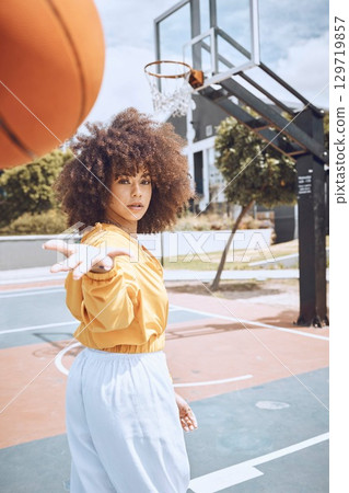 Sport, fitness and training basketball player catch ball, looking confident and tough on court. Portrait sporty woman enjoying time outdoors with favorite hobby, spending weekend on healthy activity Sport, fitness and training basketball player catch ball, looking confident and tough on court. Portrait sporty woman enjoying time outdoors with favorite hobby, spending weekend on healthy activity 129719857