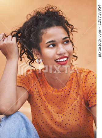 Young black woman, stylish fashion tshirt thinking and hand in trendy curly hair. Portrait of happiness, nostalgia and cool urban style. Glowing skin, sitting on the floor in jeans and happy smile Young black woman, stylish fashion tshirt thinking and hand in trendy curly hair. Portrait of happiness, nostalgia and cool urban style. Glowing skin, sitting on the floor in jeans and happy smile 129719954