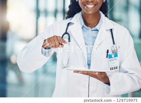 Health, woman and black doctor with tablet tech pointing to copy space mockup. Healthcare, wellness and medicine with African medical professional with wireless digital technology at hospital mock up 129719975