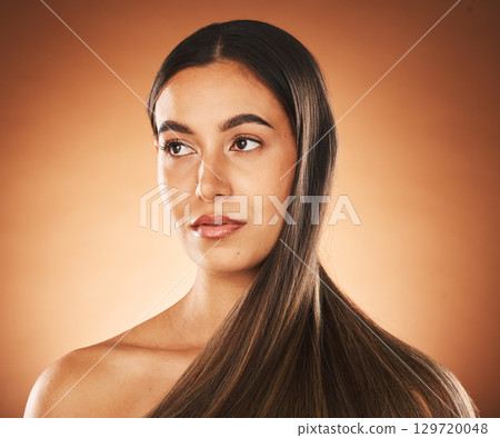 Woman skincare, beauty and hair care with face, makeup or cosmetic advertising in brown studio background. Shampoo product, marketing or headshot of model, self care and facial cosmetics or wellness Woman skincare, beauty and hair care with face, makeup or cosmetic advertising in brown studio background. Shampoo product, marketing or headshot of model, self care and facial cosmetics or wellness 129720048