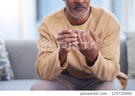 Mature man, hands or touching wedding ring on sofa in house, home or marriage counseling in divorce, break up or loss. Sad, anxiety stress or mental health for widower or middle aged person with band Mature man, hands or touching wedding ring on sofa in house, home or marriage counseling in divorce, break up or loss. Sad, anxiety stress or mental health for widower or middle aged person with band 129720060