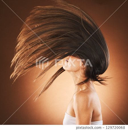 Beauty, hair care and flip profile with a model on gradient background for cosmetics, transformation and shampoo for growth and shine. Model in studio for freedom, beauty salon and hairdresser Beauty, hair care and flip profile with a model on gradient background for cosmetics, transformation and shampoo for growth and shine. Model in studio for freedom, beauty salon and hairdresser 129720068