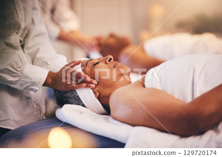 Spa, massage and head of senior woman while on table to relax for calm, peace and zen time with a therapist for health and wellness. Patient get facial with cosmetics, skincare and detox treatment 129720174
