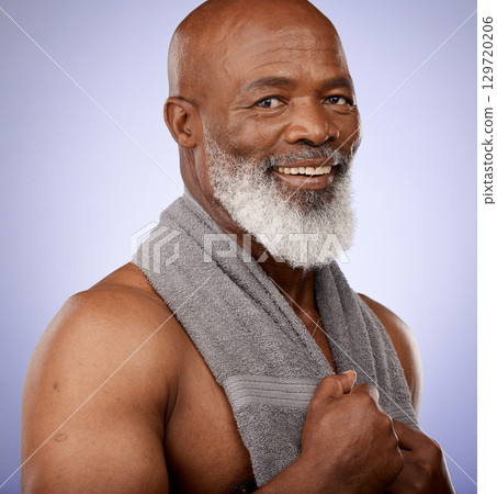 Portrait, black man and shower with towel for healthy skincare, hygiene and wellness on studio background. Male beauty, clean body care and mature guy happy after spa sauna, bathroom and cosmetics 129720206