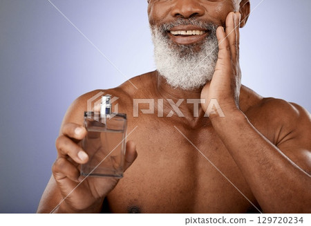 Black man with perfume, beauty and cosmetic with parfum product for cosmetics and body care against studio background. Senior model, cologne and skin with wellness and spray for scent and fragrance. 129720234