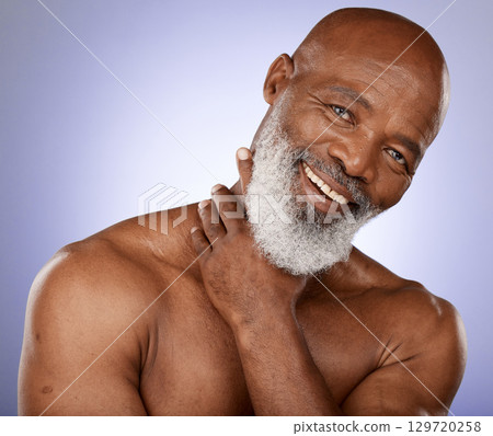 Skincare, face and black man in studio for beauty, cosmetics wellness and fitness with marketing or advertising space on purple background. Portrait of senior model, health and glow for dermatology Skincare, face and black man in studio for beauty, cosmetics wellness and fitness with marketing or advertising space on purple background. Portrait of senior model, health and glow for dermatology 129720258