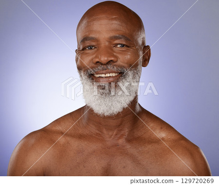 Skincare, happy and portrait of senior black man with satisfied smile for natural cosmetic wellness. Aesthetic, self care and dermatology of mature body care model on purple studio background. 129720269