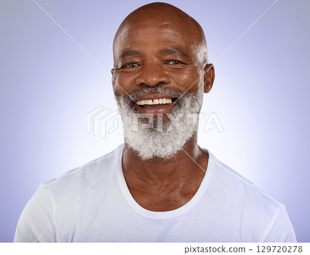 Portrait, cosmetics and senior man with skincare, for natural beauty and health against blue studio background. Confident, black mature male and happy for wellness, smooth and clear skin with smile. 129720278