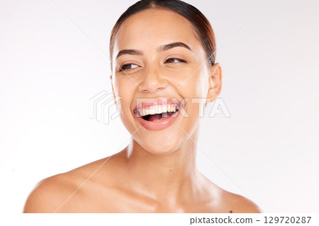 Smile, young woman and skincare for wellness, health and laugh with confidence on studio background. Cosmetics, Latino female or confident girl for health, makeup or natural beauty for organic facial 129720287