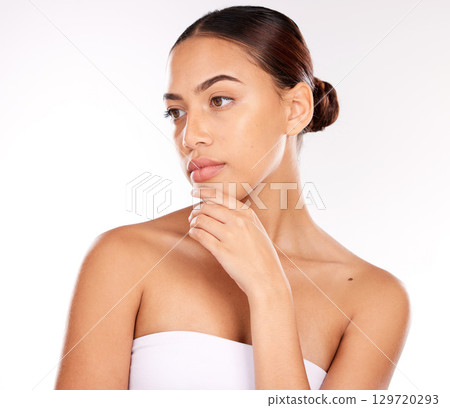 Thinking, skincare and studio woman for beauty, cosmetics and makeup idea, inspiration or marketing on white background. Glow, shine and healthy skin care of young girl model for dermatology results 129720293