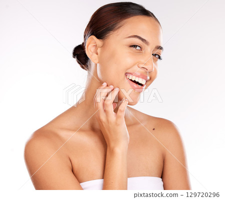 Skincare, beauty and portrait of latin woman on a white background in studio for wellness, spa and body care. Dermatology, health and face of happy girl for treatment, skincare products and cosmetics Skincare, beauty and portrait of latin woman on a white background in studio for wellness, spa and body care. Dermatology, health and face of happy girl for treatment, skincare products and cosmetics 129720296
