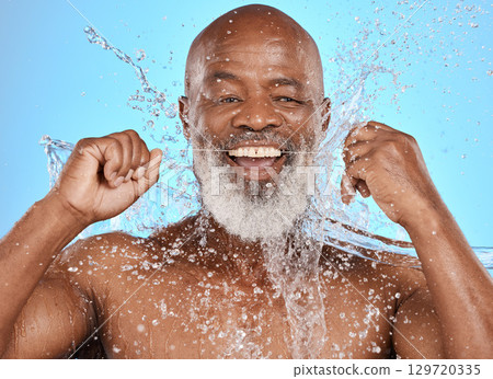 Oral, man floss and water with smile, wellness and on blue studio background. Portrait, mouth health or senior black male with dental hygiene, liquid splash or fresh breath for clean teeth and relax. Oral, man floss and water with smile, wellness and on blue studio background. Portrait, mouth health or senior black male with dental hygiene, liquid splash or fresh breath for clean teeth and relax. 129720335