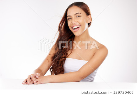 Hair, skincare and portrait of woman in beauty salon studio with cosmetics, aesthetic and natural makeup promotion on mockup space. Happy woman, youth model and hair care, headshot or marketing face 129720405