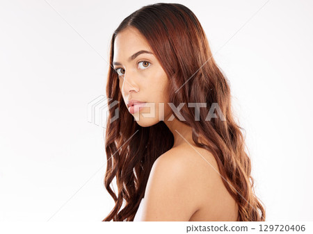 Hair care, woman and serious face of a model after salon, skincare and hairdresser treatment. Shampoo, cosmetic and dermatology or a person with beauty wellness, cosmetics and luxury facial 129720406