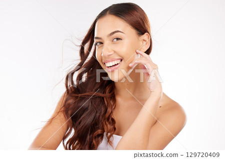 Beauty, hair care and portrait of woman in studio for wellness, skincare and luxury grooming on white background. Face, girl and model with long hair relax after facial, skin and glamour treatment Beauty, hair care and portrait of woman in studio for wellness, skincare and luxury grooming on white background. Face, girl and model with long hair relax after facial, skin and glamour treatment 129720409