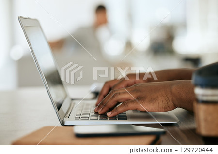 Hands typing, working and computer planning of a black woman in a coffee shop with digital work. Web development, woman and tech programmer coding a website design doing remote work in a restaurant Hands typing, working and computer planning of a black woman in a coffee shop with digital work. Web development, woman and tech programmer coding a website design doing remote work in a restaurant 129720444