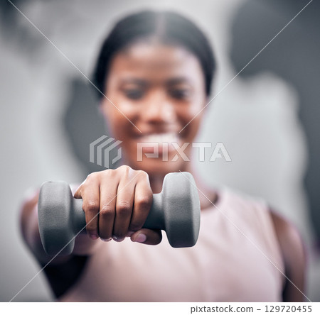 Weights, fitness and black woman training at gym, body motivation and muscle exercise. Sports hand, weightlifting and portrait of an African athlete with health workout, power and strong cardio Weights, fitness and black woman training at gym, body motivation and muscle exercise. Sports hand, weightlifting and portrait of an African athlete with health workout, power and strong cardio 129720455