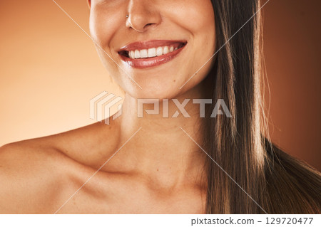 Happy, smile and woman with hair care, skincare and beauty cosmetic treatment in a studio. Happiness, health and girl model with a wellness facial skin routine isolated by a gradient brown background Happy, smile and woman with hair care, skincare and beauty cosmetic treatment in a studio. Happiness, health and girl model with a wellness facial skin routine isolated by a gradient brown background 129720477