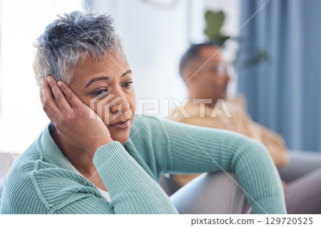 Depression, divorce and senior couple with marriage problem, mental health risk and home stress or anxiety in living room. Thinking, sad and depressed elderly or old woman with partner for counseling 129720525