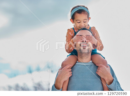 Father, child on shoulder and hands on eyes on nature walk for happy bonding, family time and relationship love. Dad, girl and kid daughter with a smile walking on outdoors mockup adventure together 129720590