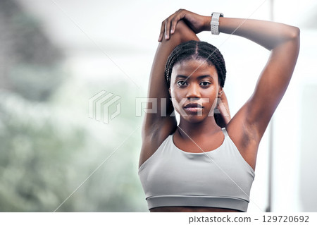 Black woman, arm or stretching in fitness, workout or training in muscle recovery, pain relief or healthcare wellness. Portrait, runner or sports athlete in warm up exercise or marathon running goals 129720692