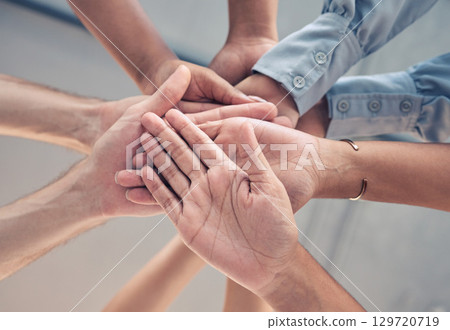 Teamwork, support and stack of business people hands working together in corporate office. Community, trust and close up of hand of workers in circle for collaboration, motivation and team building Teamwork, support and stack of business people hands working together in corporate office. Community, trust and close up of hand of workers in circle for collaboration, motivation and team building 129720719