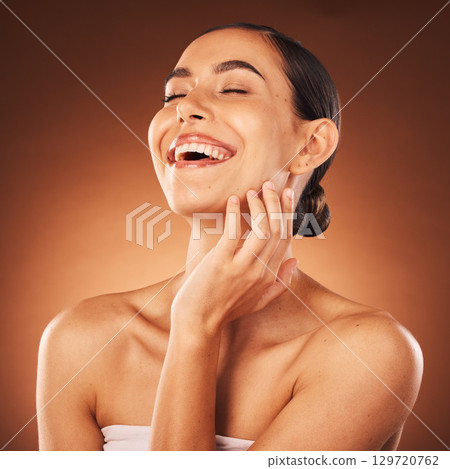 Woman beauty, face and skincare makeup, happy smile and cosmetics advertising in brown studio background. Facial wellness, happiness model and relax with self care, cosmetic and healthy skin product Woman beauty, face and skincare makeup, happy smile and cosmetics advertising in brown studio background. Facial wellness, happiness model and relax with self care, cosmetic and healthy skin product 129720762