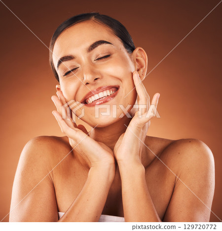 Beauty, face and skincare with smile on woman for natural cosmetics and glow against studio background. Facial, treatment and make up with skin care mock up for healthy skin wellness and cosmetic. 129720772