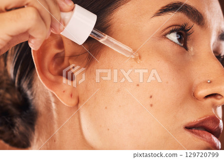 Skincare, facial and woman with beauty, product and skin, wellness and grooming with retinol, serum and collagen. Face, girl and model relax pamper treatment, mask and acne cosmetics, oil and vitamin Skincare, facial and woman with beauty, product and skin, wellness and grooming with retinol, serum and collagen. Face, girl and model relax pamper treatment, mask and acne cosmetics, oil and vitamin 129720799