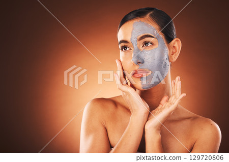 Beauty, charcoal mask with facial and woman in natural cosmetics mockup, hands frame face with skincare against studio background. Skin, treatment and detox, cosmetic product and glow with wellness. 129720806