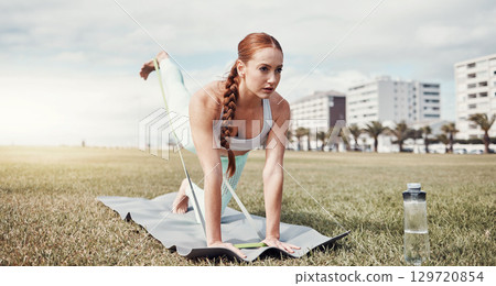 Woman, stretching legs and resistance band in the city for workout, exercise or training on yoga mat. Female yogi in warm up leg stretch and elastic strap for healthy wellness or fitness in Cape Town Woman, stretching legs and resistance band in the city for workout, exercise or training on yoga mat. Female yogi in warm up leg stretch and elastic strap for healthy wellness or fitness in Cape Town 129720854