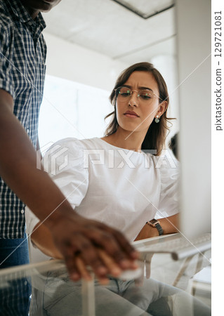 Hands, sexual harassment and woman at work frustrated with boss touching, abuse or flirting in office building. Human rights, scared and female employee uncomfortable or angry with a toxic manager 129721081