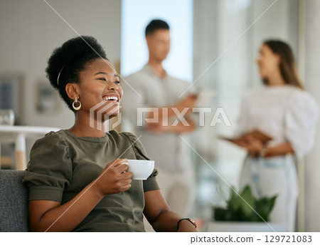 Coffee, happy and black woman with a smile at work, relax and thinking of business in a coworking office. Idea, happiness and African employee laughing at a memory with a tea drink and bokeh 129721083