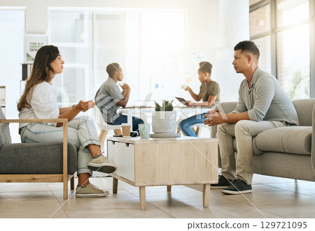 Business people, office discussion and marketing team on sofa in advertising agency for meeting, collaboration and planning. Design workers talking on couch in creative workplace, startup and lounge Business people, office discussion and marketing team on sofa in advertising agency for meeting, collaboration and planning. Design workers talking on couch in creative workplace, startup and lounge 129721095